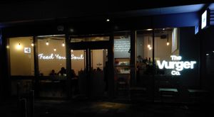 shopfront at night at The Vurger Co - Richmix Square in East London