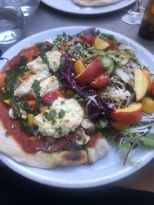 Half maraîchère pizza with mixed salad  at Les Mille Poetes in Narbonne