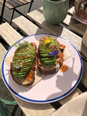 Delicious avocado toast on sourdough!  You can eat the flowers too.  at Pom Kitchen - Sharrow in Sheffield