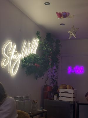 light up signs  at Pom Kitchen - Sharrow in Sheffield