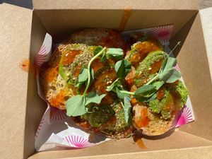 Avocado on toast + zhatar and chilli jam. The cafe makes their own bread and it’s lovely! at Pom Kitchen - Sharrow in Sheffield