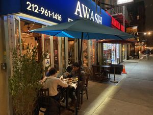 Entrance with outdoor seating at Awash in New York City