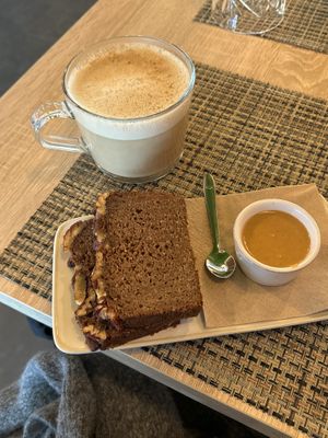 Banana bread with almond butter and chai latte  at Local - Your Healthy Kitchen in Cascais