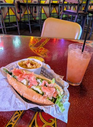 The Flipper's Style vegan dog with vegan potato salad. at Flippers Tavern in Lubbock