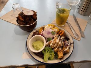 cold plate 13€ (tofu with satay, sweet potatoes, broccoli, quinoa, guacamole, cold slaw, cauliflower), extra fried cauliflower 5€ and a hot ginger, curcuma, thyme drink 6€  at Jah Jah in Paris