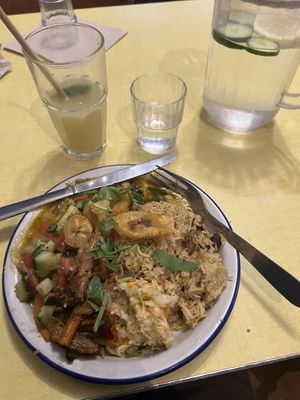 Bol chaud with curry, rice, plantains, veggie protein and a salad. Highly recommended   at Jah Jah in Paris