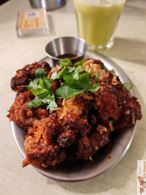 Oven-baked breaded cauliflower wings with barbecue sauce at Jah Jah in Paris