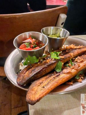 - Oven-roasted plantains served with tomato salsa and guacamole at Jah Jah in Paris