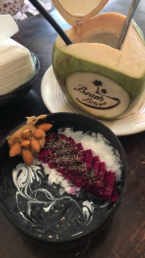 charcoal smoothie bowl and coconut at Beach Bowl in Legian