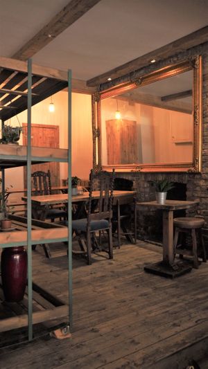 Seating inside at Romeo's Sugar Free Bakery in North London