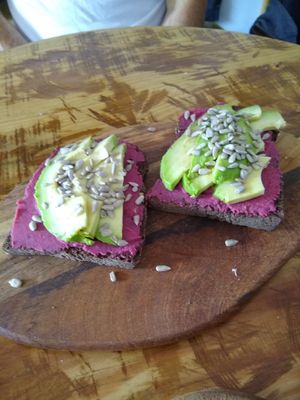 Carob bread with hummus and avocado at Sunset Bamboo Bar in Ericeira