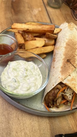 Mushroom Gyros with salat in a wrap and homemade fires with vegan tzatziki  at Karma Gardens in Arugam Bay