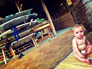 Baby Leo infront of the surf rack. at Karma Gardens in Arugam Bay