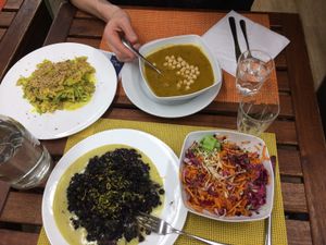 Lentil soup, small salad, carbonara of the week and black rice risotto at Silene BIO Bottega & Cucina in Vicenza
