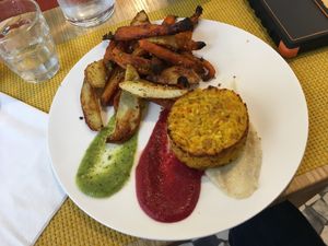 Rice medallion with tempeh, curry, and carrot at Silene BIO Bottega & Cucina in Vicenza