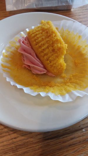 Lemon cupcake with real strawberry frosting. So good I ate most of it before my food arrived :) at Cafe Evolution in Florence