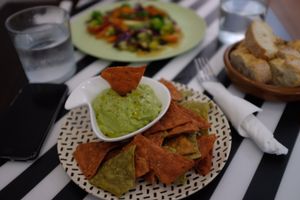 Peach guacamole with corn chips  at El Enano Verde in Torremolinos