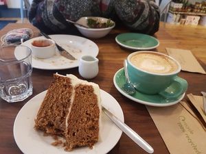 carrot cake and oat milk cappuccino at 387 Ormeau Road in Belfast