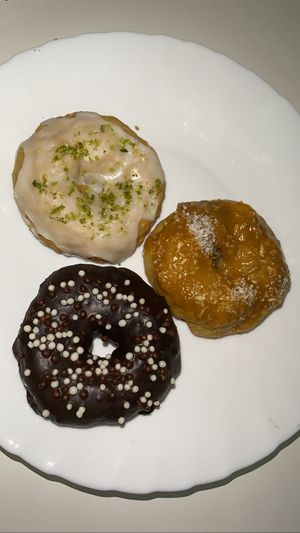 Donuts de chocolate, limão e doce de leite com coco. at Bike Vegan in Fortaleza