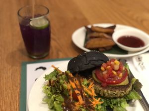 Signature burger fries and salad with purple drink  at Broccoli Revolution - Central Embassy in Bangkok