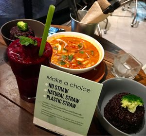 Tom yum soup, jasberry rice and beetroot smoothie, featuring the natural straw!  at Broccoli Revolution - Central Embassy in Bangkok