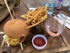 Cauliflower burger and fries with vegan rosé at Charlie Farley's in Waiheke Island