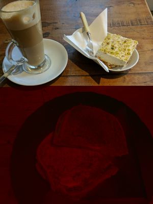 ";cheese"; and tomato toastie and cashew cheesecake. great vegan options! at Ground Up in Bury