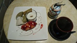 Assorted Sweets of 3 Kinds [Soy Pudding, Seasonal Sweet (Strawberry Tart), Coconut & Organic Green-tea Blancmange and Rice-flour Poundcake] ¥1300 and Breadnut &quot;Coffee&quot; ¥450. All-vegan sweets are another speciality here made by the chef with her patissier background. Soy Pudding(¥450), Seasonal Sweet(more than ¥650) & Scone(more than ¥300) can be reduced by ¥100 w/ Lunch & Miso Soup, by ¥200 w/ Recommended Chinese Tea in glass(¥400). Assortment of 2 kinds for ¥1000. at Sarasya Shinsen Chaen in Tokyo