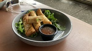Vegan spring rolls after a couple bites  at Cafe Diversity in Moreton Bay Region