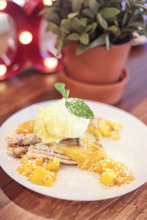 Tropical STAKK, Mango, Passionfruit sorbet and Coconut on pancakes! at Stakks Pancake House in Southampton