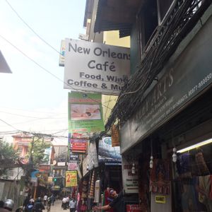 entrance from the west side, main road. there is also another entrance from the passage.  at New Orleans Cafe & Wine Bar in Kathmandu