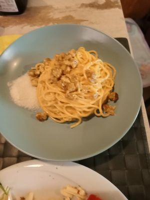 Spaghetti Carbonara with parmesan at Nirvana in Florence