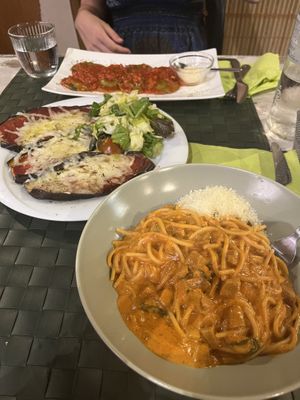 Ravioli, spaghetti amatriciana, eggplant parm  at Nirvana in Florence