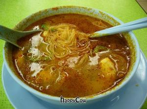 tom yam bihun sup! Spicy, lemongrass-y Malaysian soup with thin rice noodles! at Liew Chai Vegetarian in Kota Kinabalu