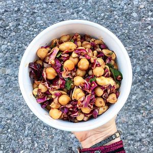 Our Thai Peanut Slaw! Packed with chickpeas, peanuts, fresh herbs, and our secret peanut curry dressing! at My Fit Little Foodie in Georgetown