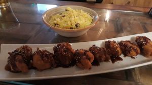 Buffalo cauliflower wings and cous-cous with sweet onion at The Kasbar in 