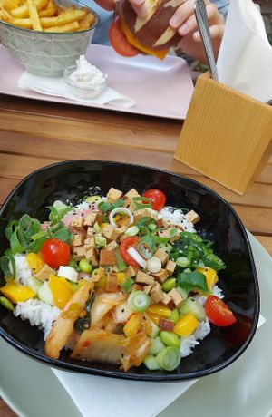 Poké bowl and burger+fries at Natureza in Prague