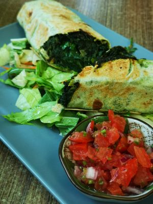 Spinach tortilla with tomato salsa and salad at Natureza in Prague