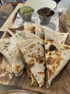 Seitan filling and cheese. Guacamole and Fried Beens. All excellent    at Katako Veg in Santiago