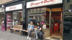 street dining and talking at Koln Kiosk in Cologne