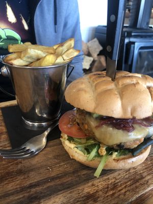 Black Bean and Red Lentil Burger (vegan upon request) with sweet potato fries  at Reflections Restaurant in Lake Tekapo