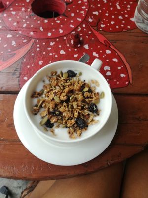 Granola bowl with coconut 'kefir' at Indah Cafe in Kuching