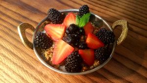 Seeds of Change granola with coconut yogurt and fresh berries at Surya Cafe in Fitchburg