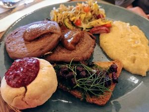 Hazelnut pancakes, raspberry thumbprint cookies, veggie scramble, grits, date butter at Surya Cafe in Fitchburg