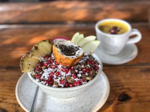 Pink smoothie bowl and golden latte  at Zest in Agonda