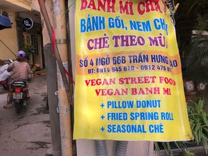 Signage on the Main Street  at Bahn Mi & Cafe in Hanoi