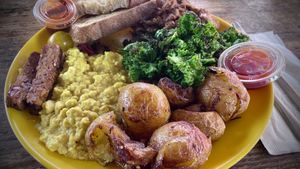 What a great breakfast along the Los Angeles river, tofu, scrambled eggs, potatoes, toast, Tempe, bacon, and mushrooms  at Spoke Bicycle Cafe in Los Angeles