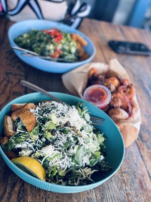 Kale caesar, chopped salad, and crispy potatoes  at Spoke Bicycle Cafe in Los Angeles