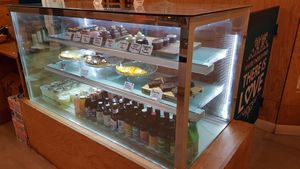 Desserts and beverages display at Green Love in Marseille