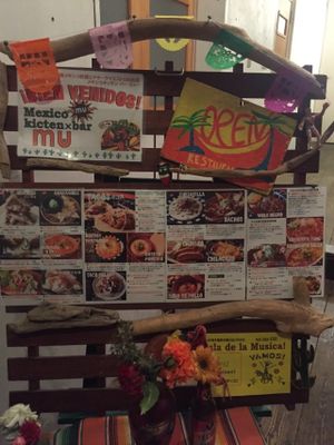 Outside signboard when you see this go down to the basement at Mexican Kitchen Bar MU in Osaka